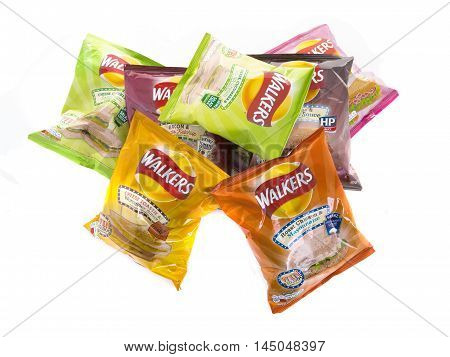 SWINDON UK - AUGUST 27 2016: Bags of Wlakers new Flavour crisps isolated on a white background. Walkers is a British snack food manufacturer