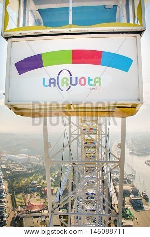 Rimini Italy - January 4 2015 - City view and a white cabin of the Rimini's ferris wheel 