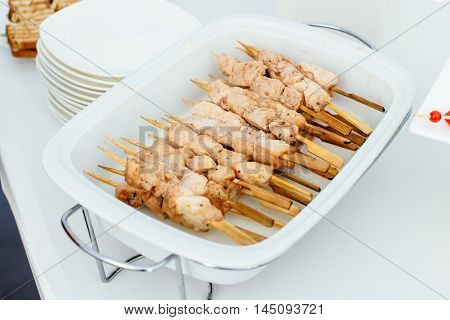 Salmon kebabs only fish on wooden skewers. Katering