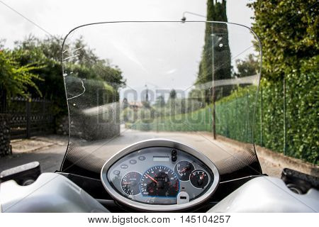 Scooter driving around the Lake Garda italy