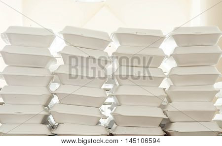 Stacks of foam boxes - environmental problem concept