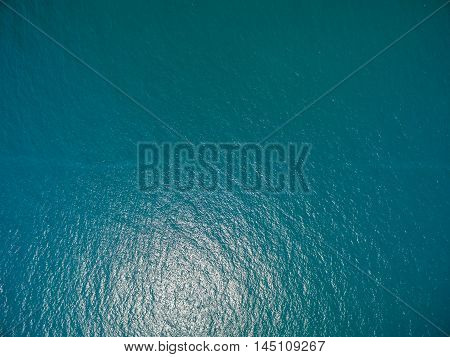 the surface of the water, turquoise in color with bird's eye