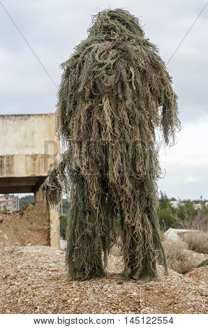 Ghillie suit sniper scope and rifle camouflage
