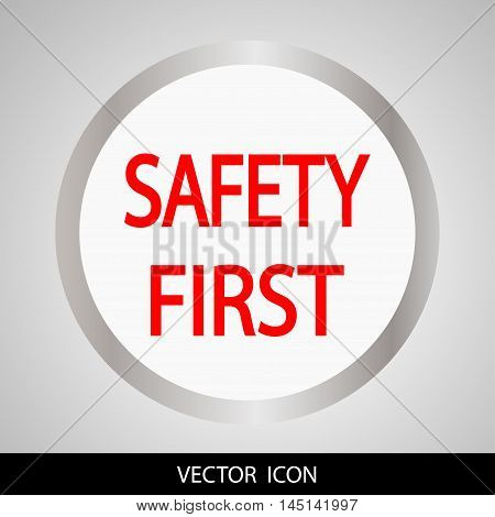 Safety first icon. Grey Round glossy icon with a red pattern on a light background