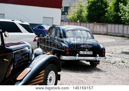 Podol, Ukraine - May 19, 2016: Back View Of Goes On Road Gaz-12 Zim, Luxury Soviet Limousine