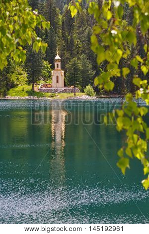 Small church at the shore of Siberian lake