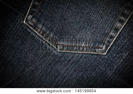 Detail close up of denim jean for men dark blue color texture background.