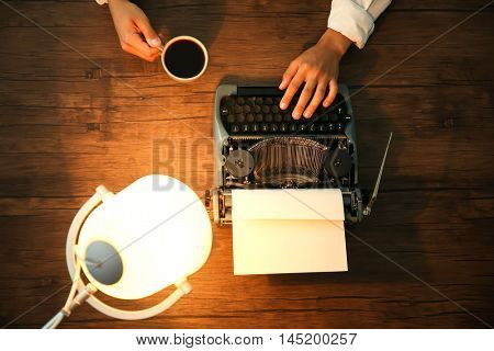 Retro reporter working at the table, top view