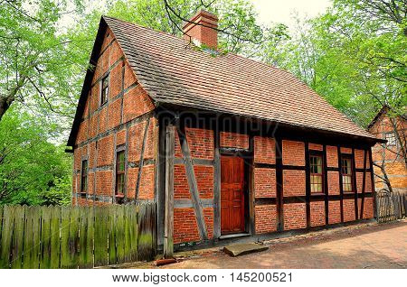 Old Salem North Carolina - April 21 2016: 1767 Moravian Third House constructed of brick and half-timber on Main Street *