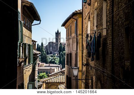 Look through the alleys of Siena in Italy