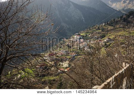 Image of sliding village Ropoto and church after a landslide in Greece