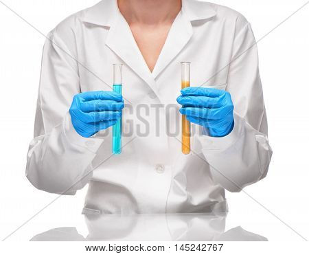 Female Holding Test Tubes With Yellow Sorbent And Blue Liquid
