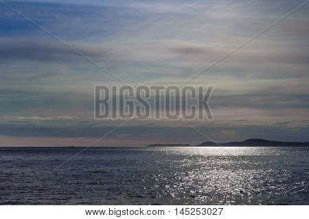 Sunset on Pacific ocean in Deception Pass at twilight Washington State USA