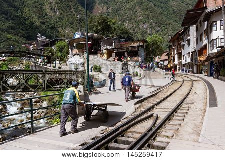 Workers Delivering Supplies By Hand