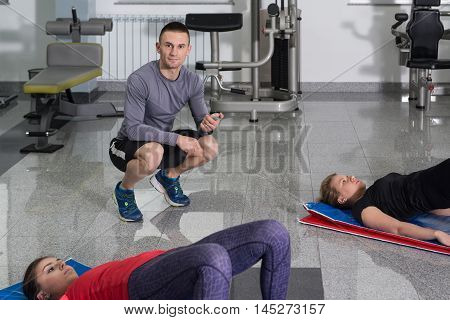 Gym People Stretching And Looking Very Happy