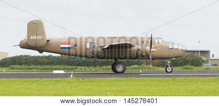 Leeuwarden, The Netherlands - June 10: Ww2 B-25 Mitchell Bomber In Dutch Markings Take Off During Th