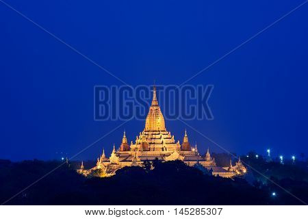 golden pagoda in early mornig with blue sky background
