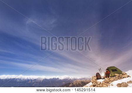 Camping on the top of the mountain in winter.