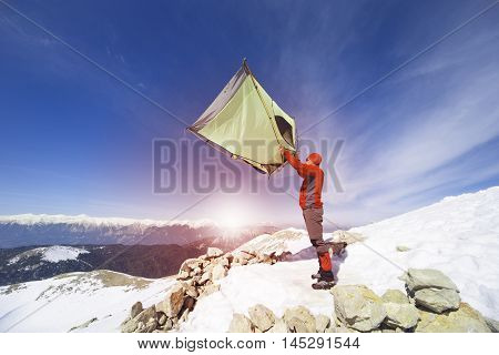 Camping on the top of the mountain in winter.