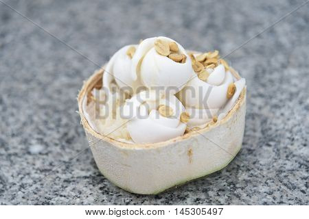 Coconut ice cream with nut in Coconut shell.
