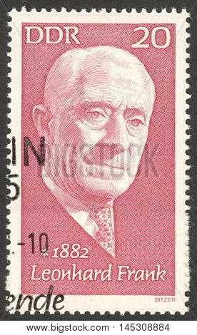 MOSCOW RUSSIA - CIRCA AUGUST 2016: a stamp printed in DDR shows a portrait of Leonhard Frank the series 