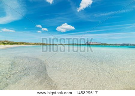 soft clouds over Lu Impostu beach Sardinia