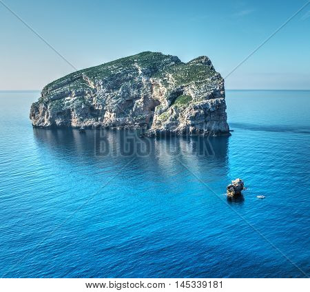 a  boat by foradada island in Sardinia