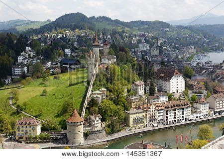 LUCERNE SWITZERLAND - MAY 04 2016: Towers of Lucerne's ancient city walls. These historic fortifications are called Musseg and are mostly very well preserved
