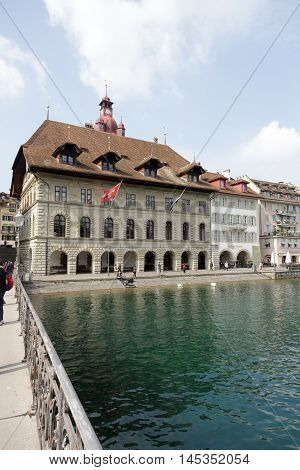 LUCERNE SWITZERLAND - MAY 02 2016: Town Hall was built in the early 1600s it is impresive building by the river Reuss.