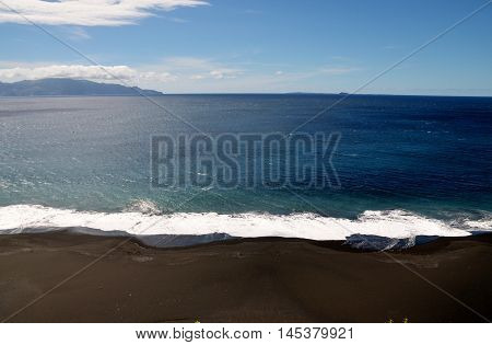 Waves With Brava In Background
