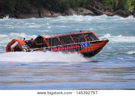 NIAGARA FALLS, CANADA. JULY 15, 2016.
Niagara Jet Boat Tours are a popular tourist attraction that's sure to thrill and excite and not for the faint of heart.