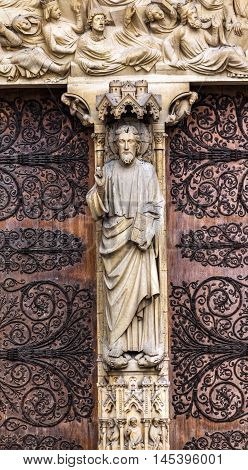 PARIS, FRANCE -  MAY 31, 2015 Judgement Door Biblical Statues Notre Dame Cathedral Paris France. Notre Dame was built between 1163 and 1250AD.