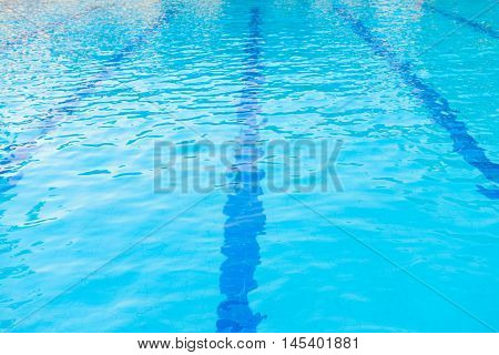 Blue water and laens in swimming pool