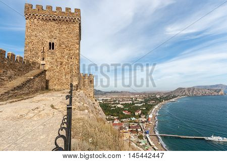 The ruins of a medieval fortress on the shore of the Black Sea. Sudak, Crimea, Ukraine.
