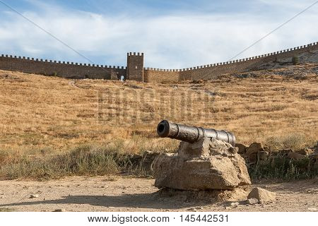 The ruins of a medieval fortress on the shore of the Black Sea. Sudak, Crimea, Ukraine.