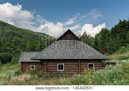 The old wooden house in the mountains. Karpaty, Ukraine.