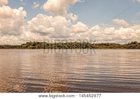 Blue Sky With White Clouds In Cuyabeno National Park Ecuador Sucumbios Province Over Laguna Grande
