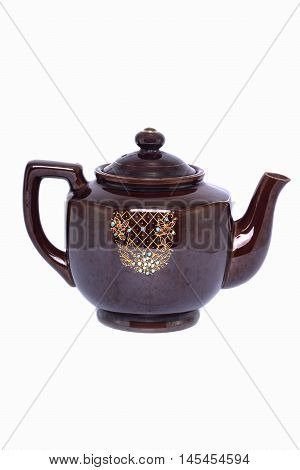 The vintage ceramic teapot isolated on a white background