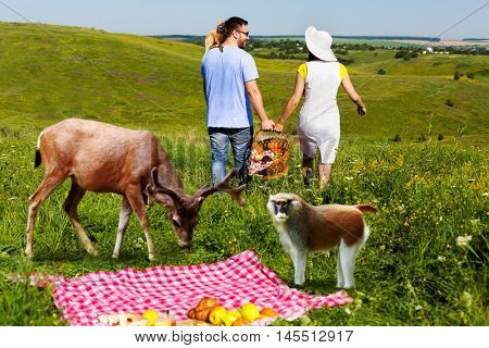 Young couple going home arter picnic