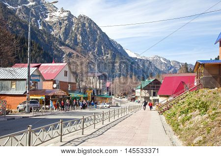 DOMBAY RUSSIA - May 03.2015: Dombai Glade. The settlement in the Caucasus Mountains skiing resort