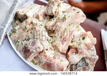Pieces of pork meat on plate. Cooking concept
