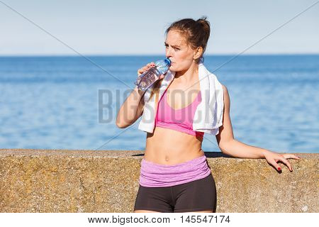 Woman Drinking Water After Sport Gym Outdoor