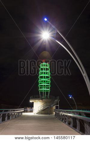 Brant Street Pier located in Burlington Ontario. Taken at night showing off its LED colour display during the summer.