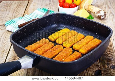Fish sticks breaded Studio Photo on Pan