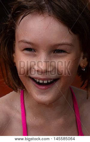 Happiness, joy, splendor a girl while swimming on vacation