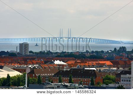 The bridge over Oresund between Copenhagen Denmark and Malmo Sweden Oresundsbron in a foggy landscape