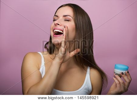 Pretty Woman With A Skin Care Product
