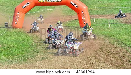Unidentified Racer Rides A Quad Motorbike.