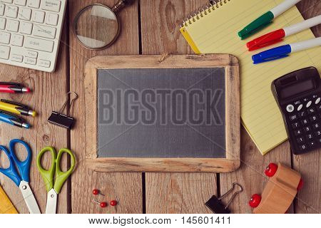 Back to school background with chalkboard. View from above