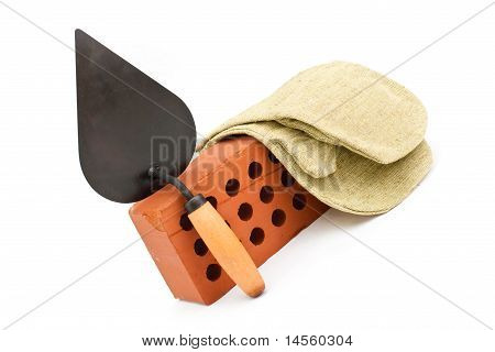 Perforated สีแดงอิฐเซรามิก พลั่ว และ Gauntlet ที่แยกต่างหากบนพื้นสีขาว